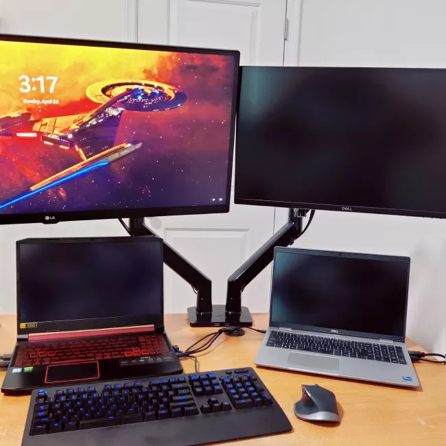 Laptops with monitors mounted above